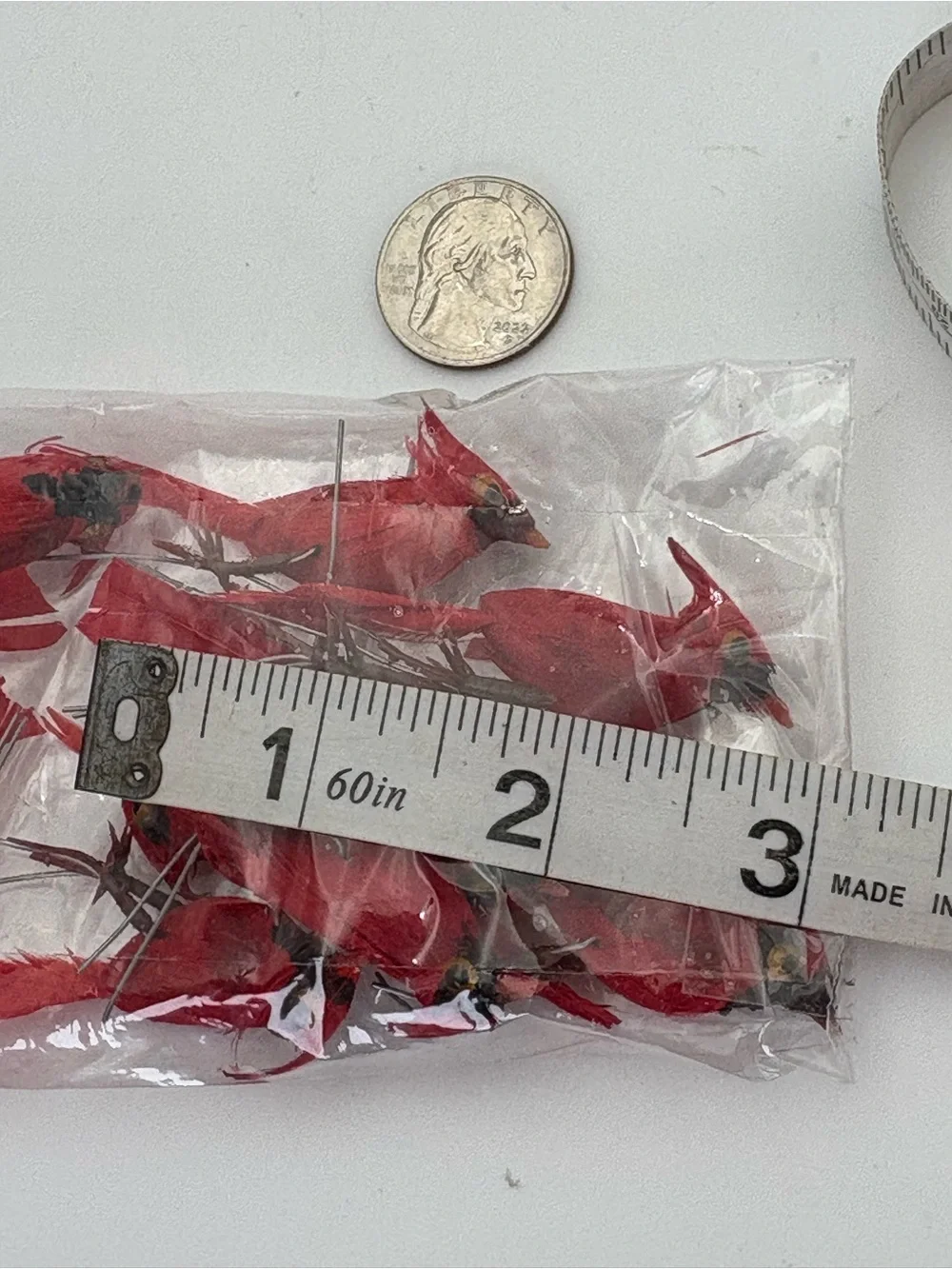 11 Crafting Redbirds with Feathers and Metal Twist Connectors